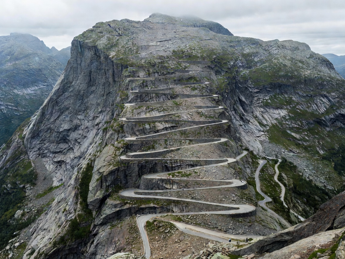 Eleven hairpin bends ascending the steep rock face of Trollstigen pass